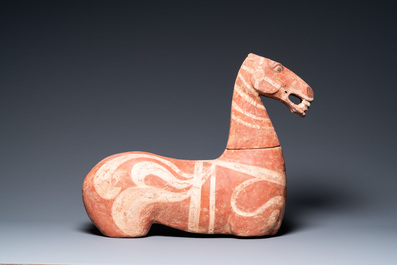 An attractive Chinese painted pottery model of a horse, Han