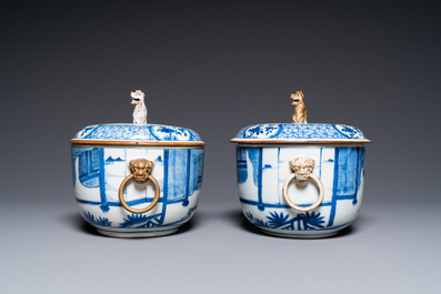 A pair of Chinese blue and white covered bowls, 19th C.