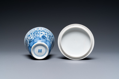 A Chinese blue and white covered cup and saucer for the French market, Kangxi