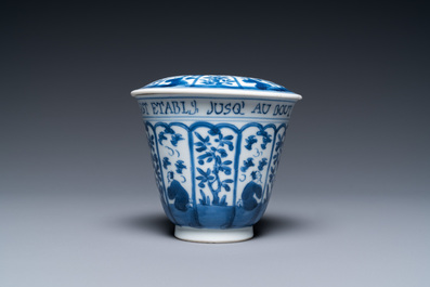 A Chinese blue and white covered cup and saucer for the French market, Kangxi