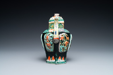 A Chinese verte biscuit reticulated teapot and cover, Kangxi