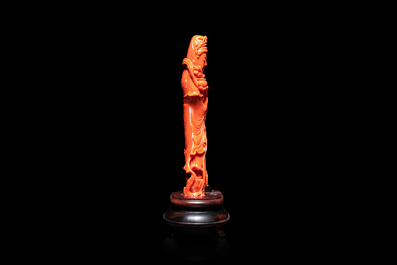 A Chinese carved red coral 'Guanyin' figure, 19/20th C.