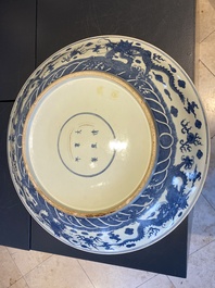 A massive Chinese blue and white 'dragon' dish, Kangxi mark, 19th C.