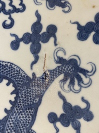 A massive Chinese blue and white 'dragon' dish, Kangxi mark, 19th C.