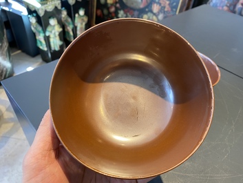 A pair of Chinese caf&eacute; au lait-glazed bowls, Qianlong mark and of the period