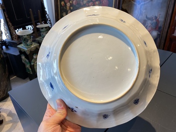 A pair of Chinese lobed blue and white 'fish' dishes, Kangxi