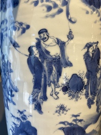 A Chinese blue and white 'Eight immortals in a rocky landscape' vase, Transitional period