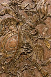 A French carved wooden 'Style Transition' panel with ribbons and acanthus leaves, 18th C.