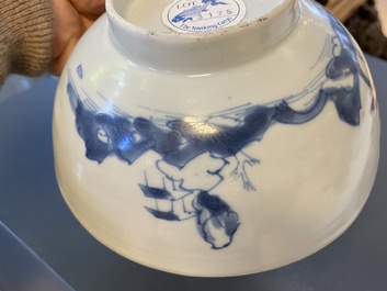 A pair of Chinese blue and white 'Nanking Cargo' bowls and a famille rose millefleurs bowl, 18/19th C.