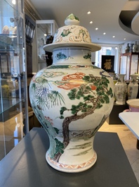 A Chinese famille verte 'Xi Xiang Ji' vase and cover, Kangxi