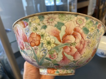 A pair of Chinese blue and white 'Nanking Cargo' bowls and a famille rose millefleurs bowl, 18/19th C.