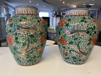 A pair of Chinese famille verte 'phoenix' vases, 19th C.