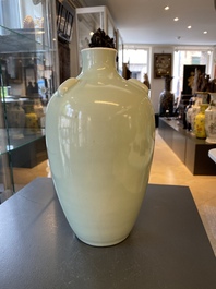 A Chinese monochrome celadon-glazed vase, Qianlong mark, 19/20th C.