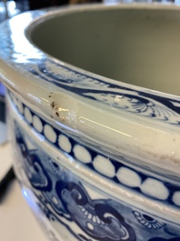 A large Chinese blue and white fish bowl with an eagle and magpies, 19th C.