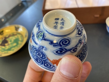 A pair of Chinese blue, white and iron-red cups and a yellow-ground 'dragon' dish, Guangxu mark and of the period