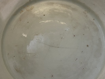 A Chinese blue and white 'dragons' fish bowl and a famille verte 'magpies' fish bowl, 19th C.