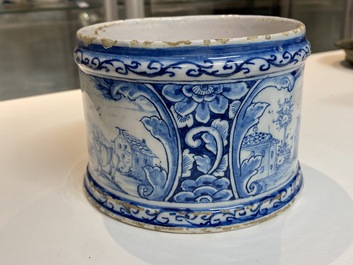 A Dutch Delft blue and white box and cover with fine landscapes, 1st half 18th C.