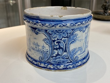 A Dutch Delft blue and white box and cover with fine landscapes, 1st half 18th C.