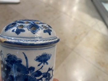 A Dutch Delft blue and white tripod caster with birds near blossoms, 1st half 18th C.