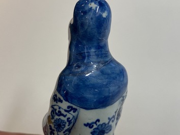 Two Dutch Delft blue and white figures of a Chinese man and woman, 1st quarter 18th C.