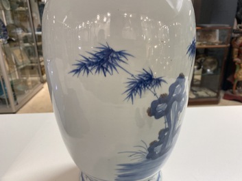 A Chinese blue, white and copper-red vase, 18/19th C.