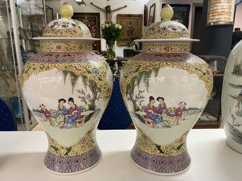 A pair of Chinese famille rose vases and covers, Qianlong mark, Republic