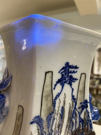 A Chinese blue, white and copper-red 'mountainous landscape' vase, 19th C.