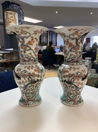 A pair of Chinese famille verte 'yenyen' vases with magpies near prunus, 19th C.