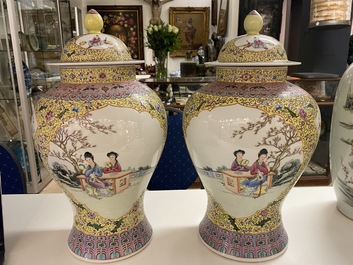 A pair of Chinese famille rose vases and covers, Qianlong mark, Republic