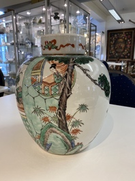 A large Chinese famille verte jar and cover, 19th C.