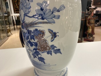 A Chinese blue, white and copper-red vase, 18/19th C.