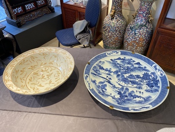 A large Chinese blue and white dish and a floral bowl, 19th C.