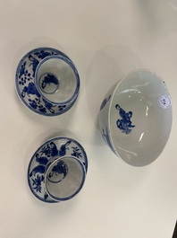 A Chinese blue and white bowl and a pair of cups and saucers, Kangxi