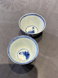 A Chinese blue and white bowl and a pair of cups and saucers, Kangxi