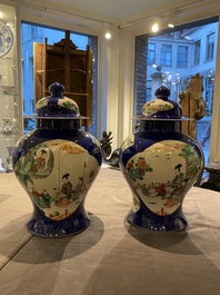 A pair of Chinese famille verte powder blue-ground vases and a fish bowl, 19th C.