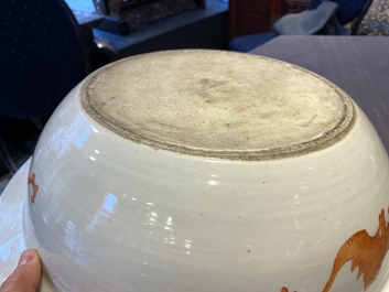 A large Chinese blue and white dish and a floral bowl, 19th C.