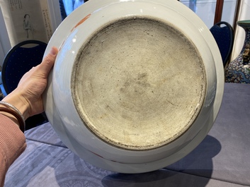 A large Chinese blue and white dish and a floral bowl, 19th C.