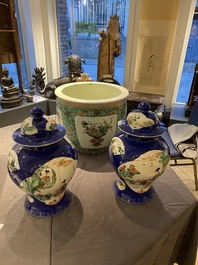 A pair of Chinese famille verte powder blue-ground vases and a fish bowl, 19th C.