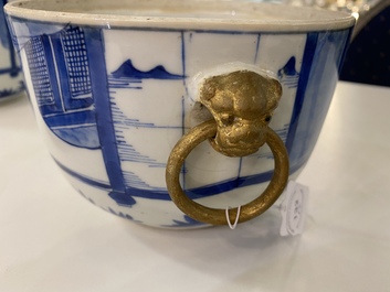 A pair of Chinese blue and white covered bowls, 19th C.