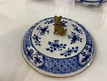 A pair of Chinese blue and white covered bowls, 19th C.