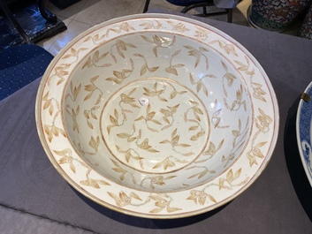 A large Chinese blue and white dish and a floral bowl, 19th C.