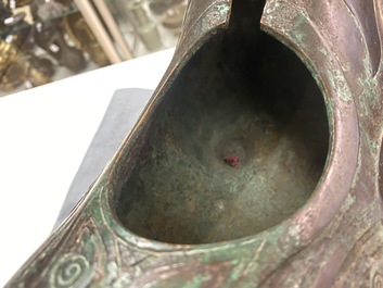 A Chinese ram-shaped silver-inlaid bronze 'xizun' vessel, Ming