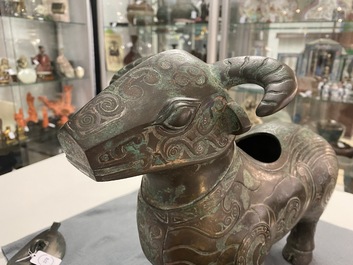 A Chinese ram-shaped silver-inlaid bronze 'xizun' vessel, Ming