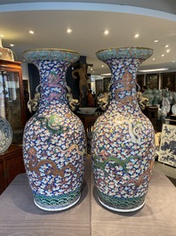 A pair of large Chinese famille rose 'dragon' vases, 19th C.