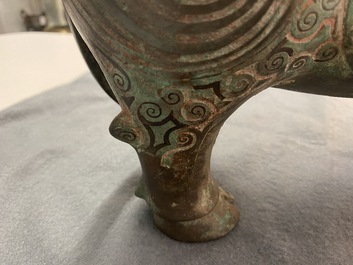 A Chinese ram-shaped silver-inlaid bronze 'xizun' vessel, Ming