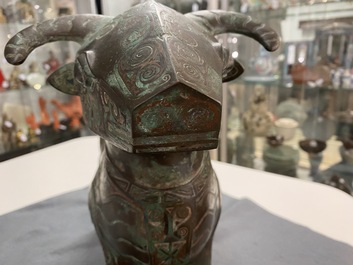 A Chinese ram-shaped silver-inlaid bronze 'xizun' vessel, Ming