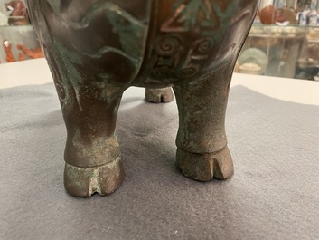 A Chinese ram-shaped silver-inlaid bronze 'xizun' vessel, Ming