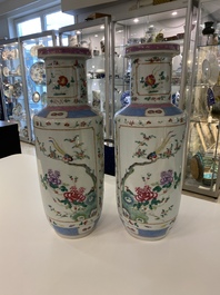 A pair of Chinese famille rose rouleau vases, 19th C.