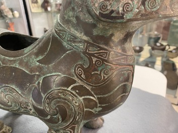 A Chinese ram-shaped silver-inlaid bronze 'xizun' vessel, Ming