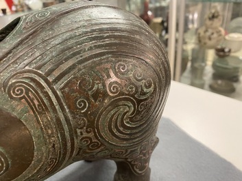 A Chinese ram-shaped silver-inlaid bronze 'xizun' vessel, Ming